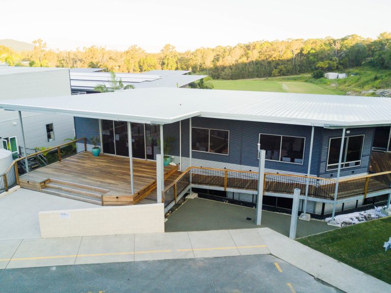 Carports Sunshine Coast - carport expansion on grey shed home
