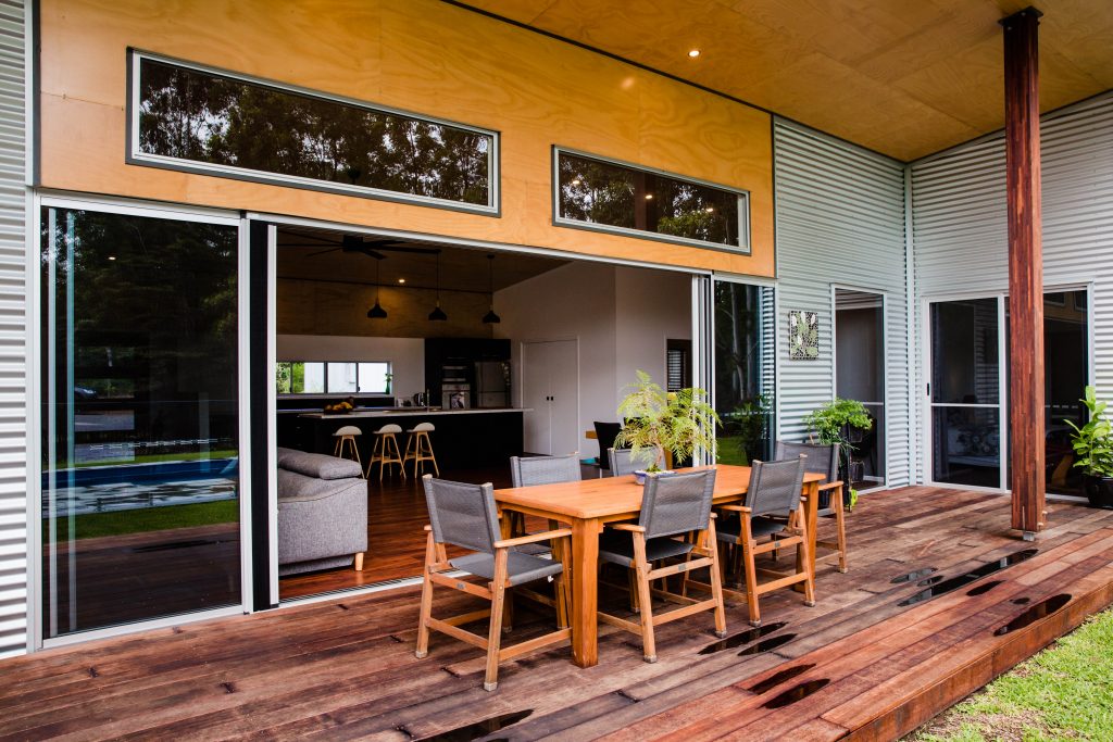 designer shed house patio with table
