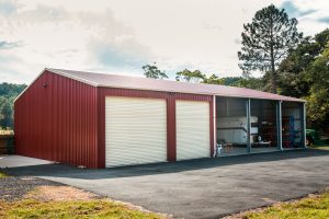 red and white barn shed on rural property